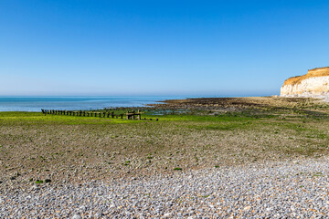 A sunny morning at Cuckmere Haven with a low tide