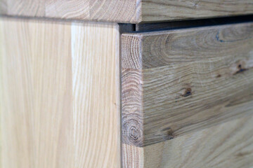 Wooden dresser surface. Natural wood furniture close view