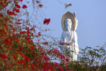 Statue of the goddess Guanyin on the territory of Nanshan buddhist culture park, Hainan island	