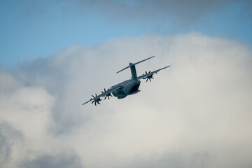 Fototapeta na wymiar RAF Royal Air Force Airbus A400M Atlas military transport plane on a cargo parachute drop run over Wiltshire UK