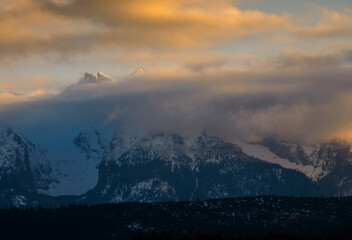 Mountain landscape.. Mountain peaks covered with clouds. View of the Tatra Mountains from the Spisz. Lapszanka. Poland.