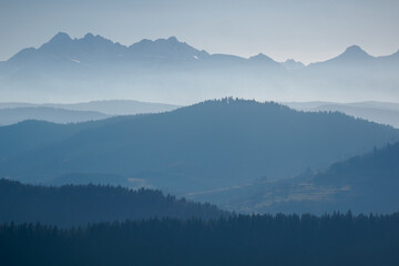 Mountain landscape.. Many visible plans - hill ranges. View of the Tatra Mountains from the Pieniny Mountain Range. Slovakia.