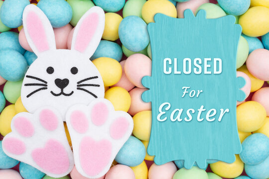 Closed for Eater sign with a bunny and Easter eggs candy