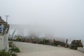 View of Golden Gate bridge hidden completely by fog