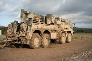 British army MAN SVR (Support Vehicle Recovery) 8x8 Truck pulling a trailer, Wiltshire UK