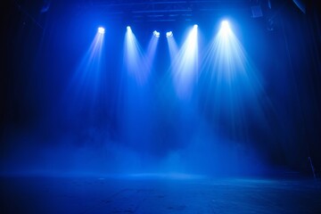 Spotlights illuminate empty stage blue background