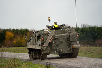 Fototapeta premium close-up of a British army Warrior FV512 Vehicle in action on a military exercise