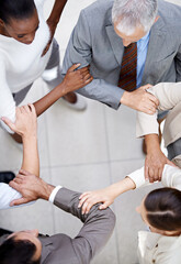 Business people, top view and arm circle in office in support for teamwork, collaboration or partnership. Corporate, solidarity or team with elbow link for mission unity, trust or workflow efficiency