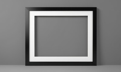 An empty black picture frame against a gray background invokes potential for art and creativity. The void beckons for a masterpiece to fill its space.