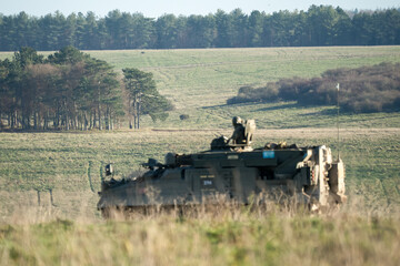 British army Warrior FV512 mechanized recovery vehicle REME in action on a military exercise...