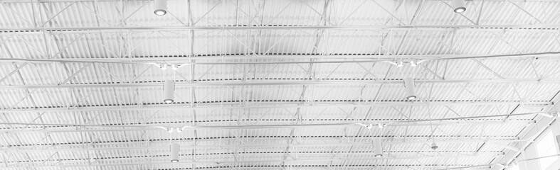 Panorama modern steel ceiling warehouse with roof beam lights, ceiling mounted wireless router, perimeter track corresponding membrane clicks into, spacious pavilion exhibitions, Frisco, Texas