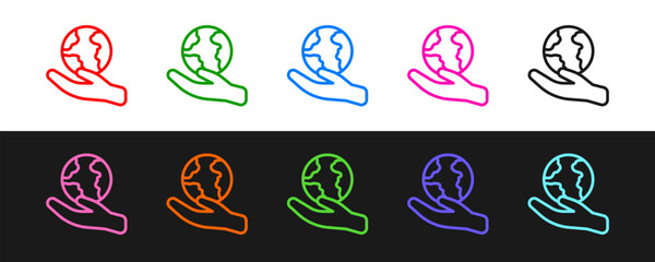 Set line Human hand holding Earth globe icon isolated on black and white background. Save earth concept. Vector