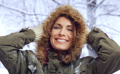 Woman, happiness and portrait in nature with snow, winter season with fur coat for fashion, good mood and holiday. Peace, calm and cold with comfort in jacket for weather, ice or frozen with smile