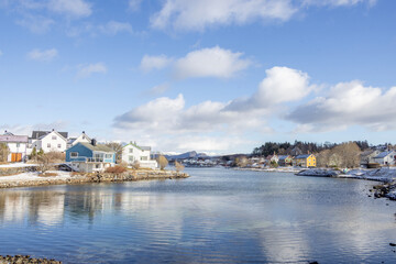 Fototapeta na wymiar Easter snow has arrived with sun and cold weather in Brønnøysund town, Helgeland, Norway