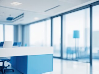 blurry light blue background of a contemporary executive workspace.