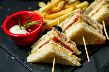 Halved Sandwich With French Fries