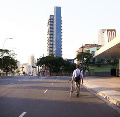 Bicycle, city and business man in street for travel, morning commute and walking to work....