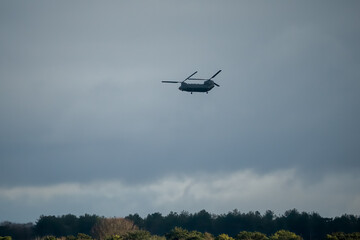 British army Chinook helicopter in low level military action, Wilts UK