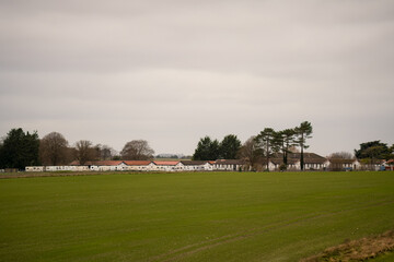 white buildings of the officers quarters at an army airfield