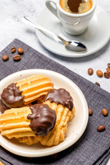 Chocolate shortbread cookies. Light background. Selective focus