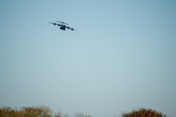 RAF Royal Air Force Airbus A400M Atlas military transport plane on a cargo parachute drop run over...