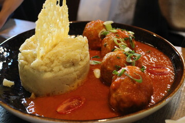 Belgian home-cooked style Boulettes (meatballs stew with tomatoes) at a restaurant in Bruges, Belgium