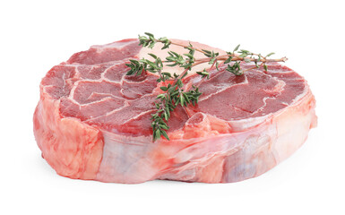Piece of raw beef meat and thyme isolated on white