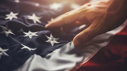 Foto op Plexiglas A hand reaching out to touch a flag, connecting personally with the meaning of Memorial Day, with copy space © Катерина Євтехова