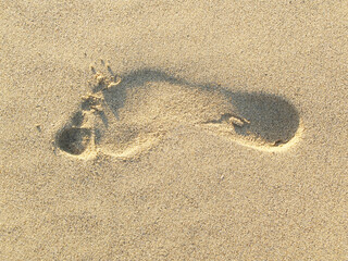 Fuß im Sand.Abdruck