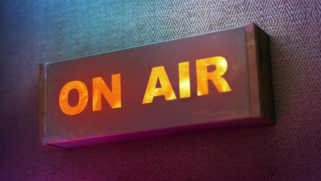 Electronic display showing red light message ON AIR