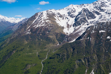 Sunny June day in the vicinity of the Baksan Gorge. Elbrus region, Kabardino-Balkaria, Russia - 759808311