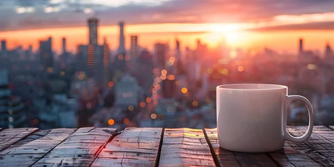  A white coffee cup sits on a wooden table in front of a city skyline © Bussakon