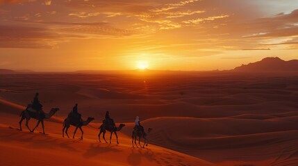 camel Caravan walking on desert at sunset