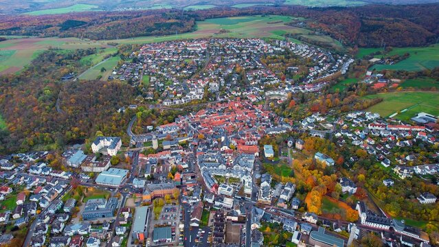 Aerial view of the old town around the city Idstein on an overcast day in fall in Germany.	