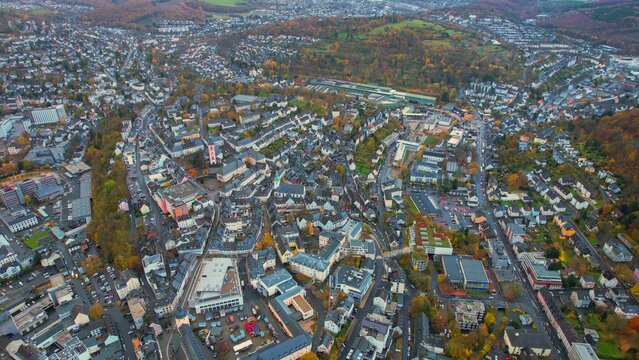 Aerial view of the old town around the city Siegen on an overcast day in fall in Germany.	