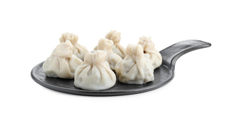 Serving board with tasty fresh khinkali (dumplings) isolated on white. Georgian cuisine