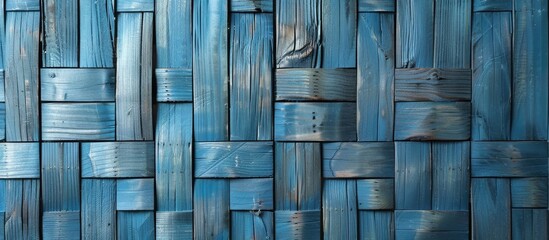Blue wooden background with tightly woven planks in a simple geometric design.