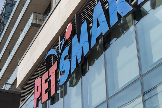 exterior building facade and sign of PetSmart, a pet supply store chain, located at 1104A King Street West in Toronto, Canada