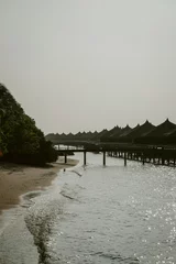 Tapeten pier on the beach © Trang