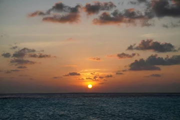 Fototapete sunset over the sea © Trang