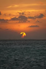 Foto auf Acrylglas sunset in the sea © Trang