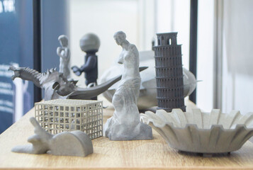 Many different art models from polyamide powder printed on 3D printer. Technology Multi Jet Fusion...
