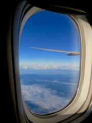 Blick aus einem Flugzeugfenster - obrazy, fototapety, plakaty