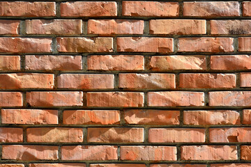 Detail of an old orange brick wall