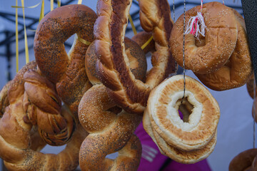 Hanged bagels with sesame seeds