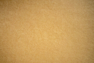 A large-size photograph of a cardboard sheet of paper. A blank cardboard sheet for the text.The...