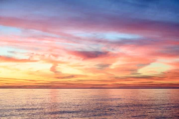 Foto op Plexiglas Colorful sunset over the winter sea © Sergey