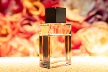 Floral aroma. Perfume spray on a bright multicolored floral background. Modern sleek design. Perfumes for women and girls