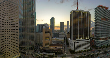 View from above of skyscraper buildings and urban traffic in downtown district of Miami Brickell in...