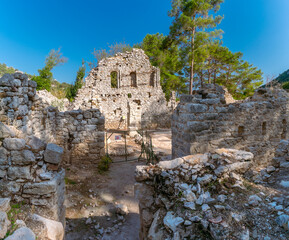 Picturesque ruins of the ancient city of Olympos, in Turkey. Ruins of the ancient city of Olympos...